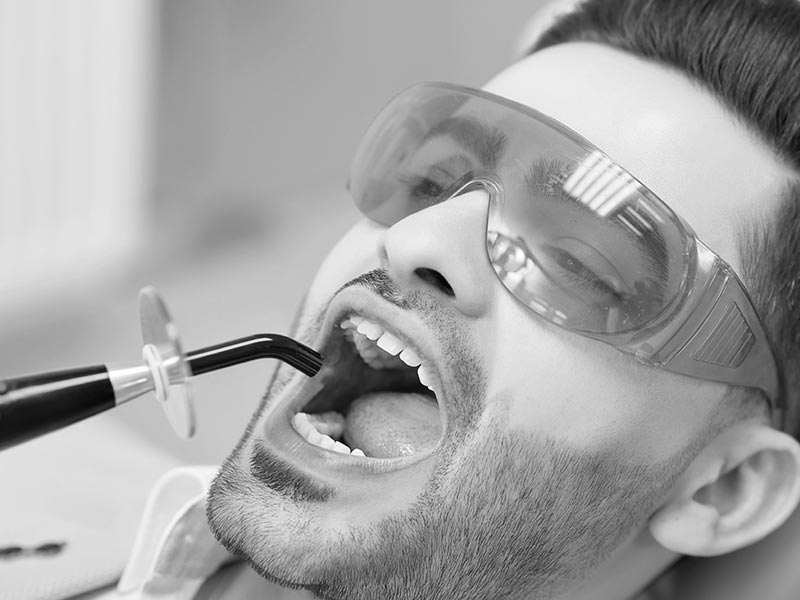 male dental patient having routine filling treatment